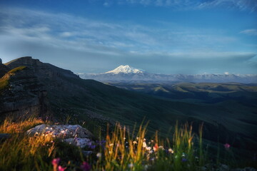 Wall Mural - Morning landscape on peaks of Mount Elbrus. Big high mountain covered with snow, Caucasus Mountains, Russia