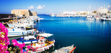 Heraklion Old Venetian Harbour With Colorful Small Fishing Boats, Yachts And Ships, Heraclion Crete, Greecer With Flowers