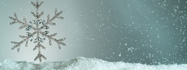 Wall Mural - Decorative Christmas Flake with Bokeh Lights and Falling Snow Flakes