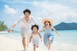 © Salsabila Ariadina - happy asian family having fun on the beach on vacation