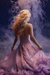 © Mykhaylo - Beautiful blonde woman in pink long dress by the sea at sunset