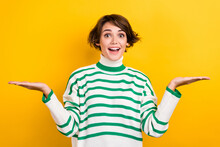 Portrait Of Excited Worker Girl Hold Open Arms Palms Novelty Select Products Wear Striped Pullover Isolated Yellow Color Background