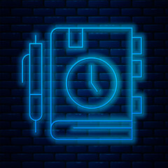 Poster - Glowing neon line Daily paper notepad icon isolated on brick wall background. Vector