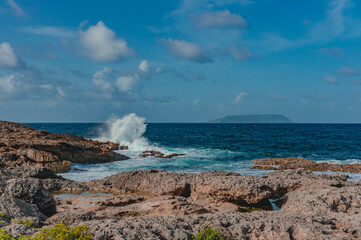 Wall Mural - Cloudy sky over Pointe de Châteaux beach in Saint-Francois, Guadeloupe, French West-Indies