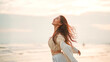 © oatawa - Side view of young asian woman with freedom on the sea beach at golden sunset, Female tourist on seaside summer vacation, Go Everywhere.