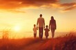 © FryArt - Happy family: mother, father, children son and daughter on sunset