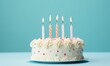 birthday cake with  five 5 candles on pastel blue background with copyspace