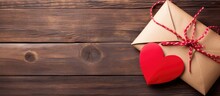 On Valentine s Day a wooden heart shaped ornament adorned with a red paper envelope and decorated with romantic lettering is the perfect background decoration for a love filled celebration