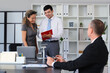 © Pixel-Shot - Business people working in office