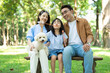 © Timeimage - Photo of young Asian family at park