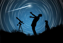 An Amateur Astronomer Rejoices When He Sees A Shooting Star, Or Comet In The Night Sky. He Is Seen With His Telescope And His Dog. A Time Exposure Of The Stars Creates Circles Of Light