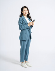 Wall Mural - Image of young Asian business woman on background