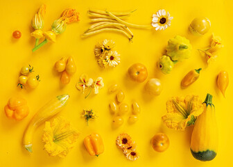 Wall Mural - Yellow vegetables on the yellow background