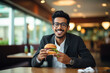 Indian college student eating burger