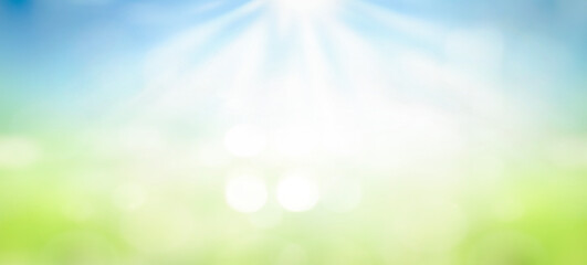Wall Mural - world environment day concept, beautiful spring blur green nature with bokeh sun light flare and blu