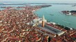 Aerial orbit view of St Mark's square and lagoon, Venice, Italy
