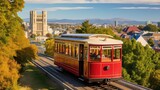 Fototapeta Londyn - Cable car with Canterbury Museum in the background, Christchurch, New Zealand.
