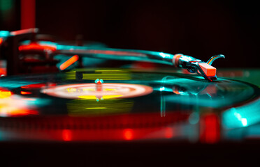 Wall Mural - Dj turntable on stage. Turntables needle playing music in nightclub