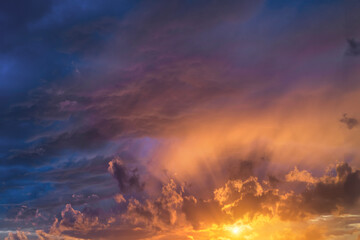 Wall Mural - glowing real sky at sunset texture background overlay. dramatic red and orange clouds.