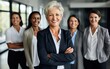 © Kowit - Head shot portrait smiling multiethnic employees group with mature businesswoman executive team leader looking at camera, happy diverse colleagues posing for photo in office, unity and cooperation