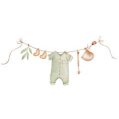 Baby clothes hang on the clothesline. Things are dried on clothespins after washing.