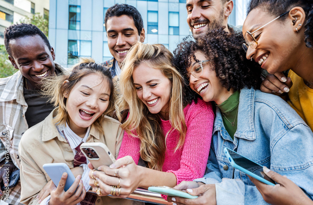 Group of young people using smart mobile phone outdoors - Happy friends ...