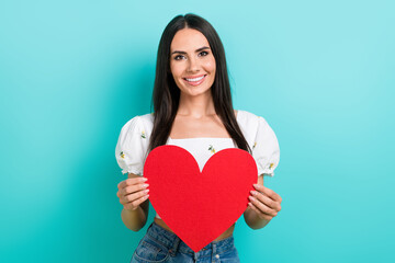 Poster - Photo of girlfriend romantic charming lady holding red paper big figure advert invitation valentine day isolated on cyan color background