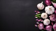 Fresh garlic on a black background. Spices, herbs. Healthy food. Free space for your text