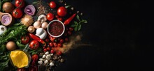 Kitchen Cooking Background: Cherry Tomatoes, Onions, Spices And Herbs. On A Black Background.