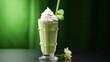  a green drink with whipped cream in a tall glass with a green straw sticking out of the top of it.  generative ai