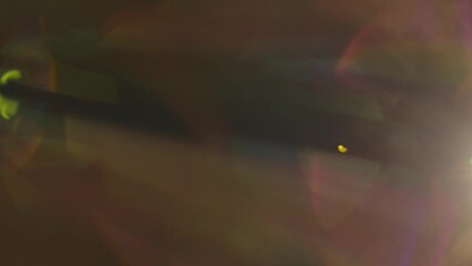 Poster - Real flare lens that is easy to use in blend or overlay modes. The side yellow light shines, creating a colorful reflection of a red and pink halo. Light transition, prism effect, light leakage.