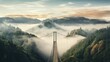  a suspension bridge in the middle of a mountain covered with fog and low lying trees in the foreground, with a mountain range in the background.  generative ai