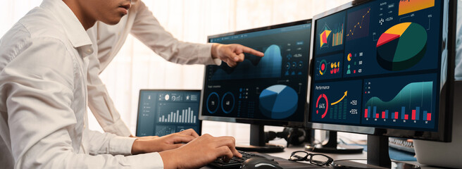Poster - Analyst working on data analysis or BI dashboard on computer monitor. Business team analyzing financial data by Fintech in corporate office for business marketing and strategy planning. Trailblazing
