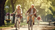 Cheerful active senior couple with bicycle in public park together having fun lifestyle