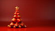 © STOCKme - red Christmas tree with gold ornaments on a red background