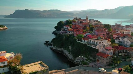 Wall Mural - Houses and settlement in Amasra city. Magnificent view of houses, mosques and the deep blue sea. Amasra, Turkey.