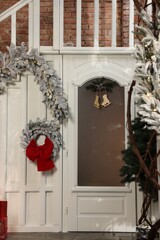 Wall Mural - Christmas garland and festive decor indoors. Interior design