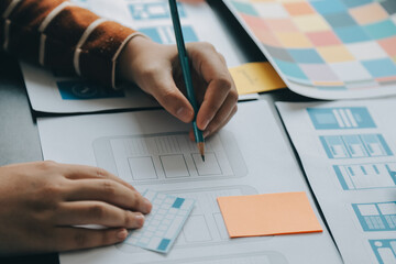 ux Graphic designer creative sketch planning application process development prototype wireframe for web mobile phone . User experience concept.