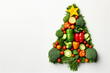 Edible Christmas tree shaped vegetable on white background with copy space