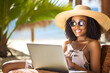 © sam - happy black woman working remotely on laptop on summer vacation - nomadic remote work concept