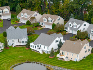 Sticker - aerial drone view of neighborhood street with single family homes