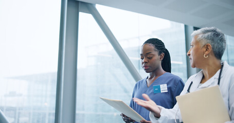 Wall Mural - Doctor, healthcare report and nurse with question for reading, hospital corridor and confused by medical results. Women, specialist and young medic with patient information, diversity and teamwork