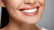 © Farid - oung beautiful woman smiling on white background. Oral hygiene concept close up. Made with generative ai