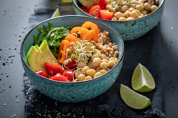 Wall Mural - Fresh salad with groats, arugula, chickpeas and vegetables.