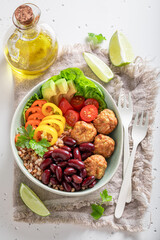 Wall Mural - Healthy Mexican salad with meat, vegetables and groats.