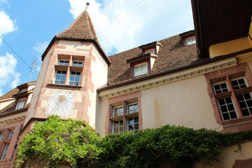 Wall Mural - sundial on the facade of a mansion (berkheim) in riquewihr in alsace in france