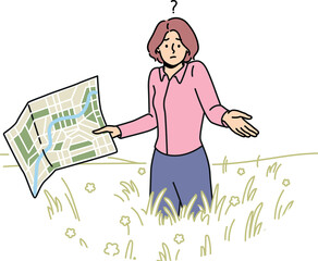 lost woman with map stands in field and shrugs shoulders, not knowing where to go to find way home