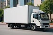 © Oksana - cargo truck with big empty bodywork mockup. empty white banner on bodywork commercial posting concept