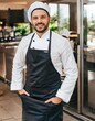 © customer solution - working in the kitchen of a hotel smiling at the camera