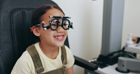 Wall Mural - Eye exam, optometry and optician with frame for girl for testing vision, sight and glasses for child eyes. Healthcare, medical equipment and young patient with woman for prescription lens in clinic